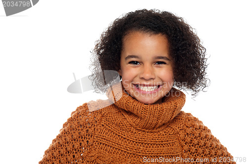 Image of Snap shot of a stylish african girl in winter clothes