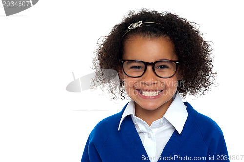 Image of Bespectacled primary girl on a white background