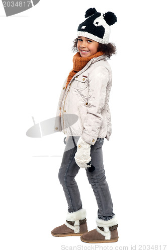 Image of Cute girl winter portrait, full length shot