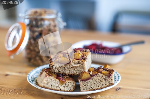 Image of Delicious cereals, raspberry sauce and fruit pie