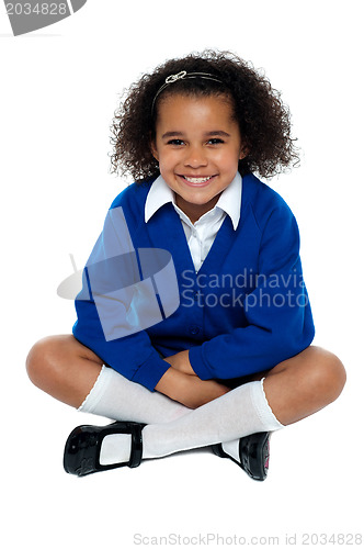 Image of Charming African school girl flashing a smile