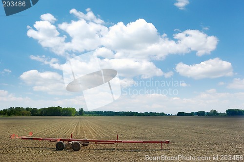 Image of Red cart left in the field
