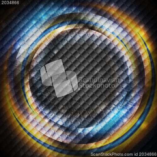 Image of Blue and orange rings on dark square texture