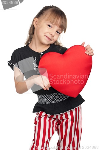 Image of Little girl with red heart