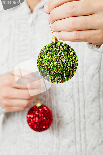 Image of Red and green Christmas baubles