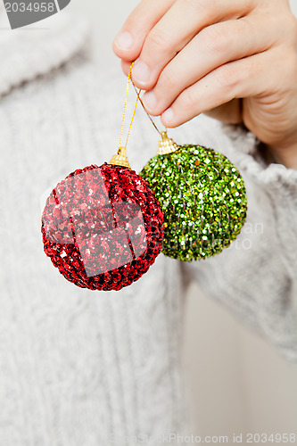Image of Red and green Christmas baubles