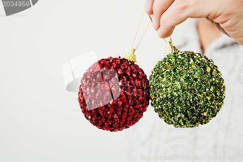 Image of Red and green Christmas baubles