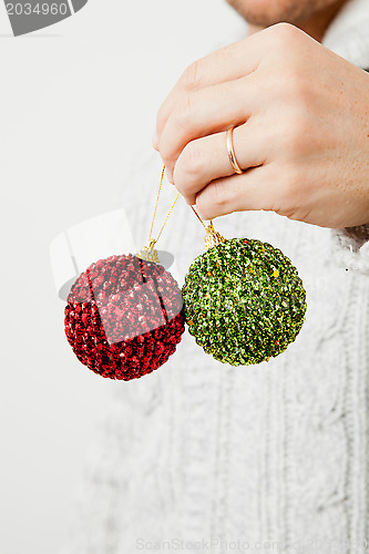 Image of Green and red Christmas baubles