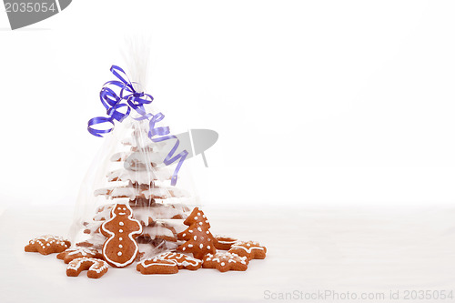 Image of christmas gingerbreads tree on white background
