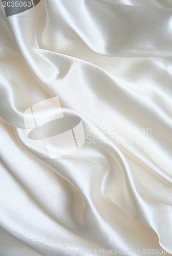 Image of Smooth elegant white silk as background 