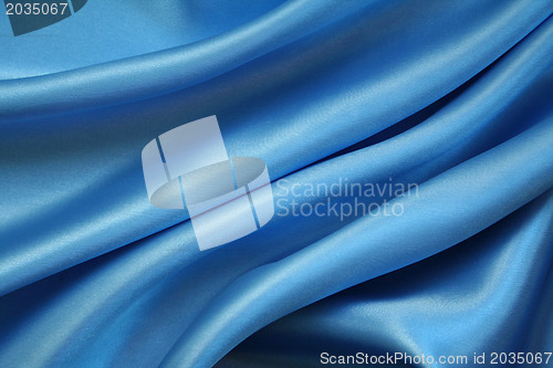 Image of Smooth elegant blue silk as background