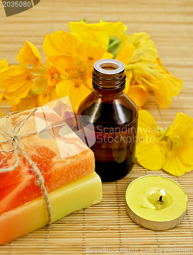 Image of Oil with nasturtiums and candle