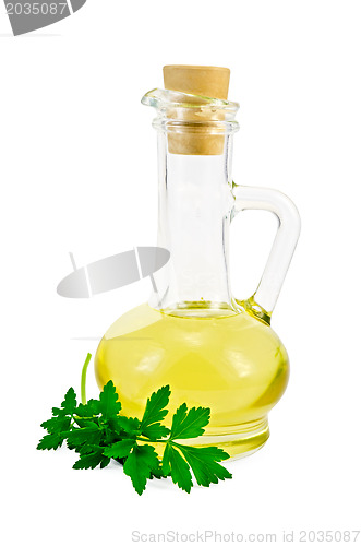 Image of Vegetable oil in a carafe with parsley