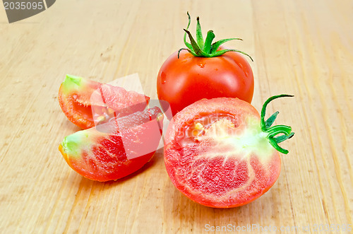 Image of Tomatoes on a wooden board