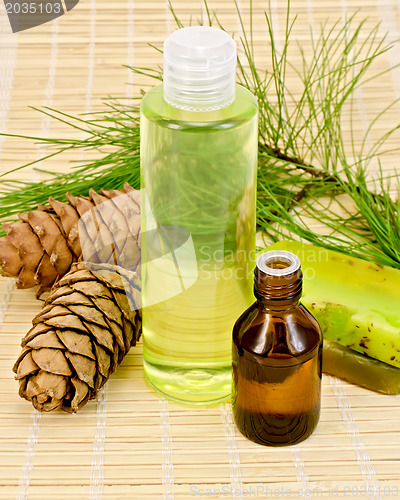 Image of Oil and shower gel with cedar cones