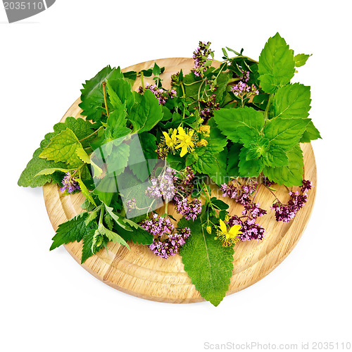 Image of Herbs on a round board