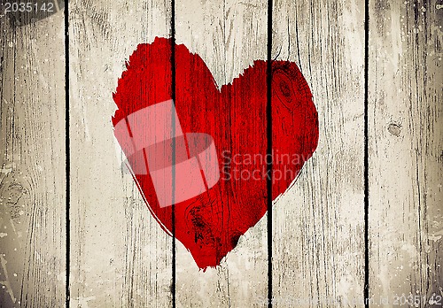 Image of Heart on old wooden wall
