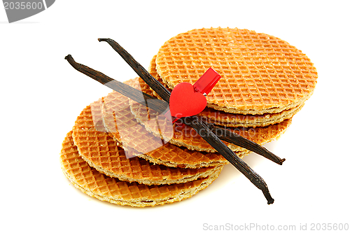 Image of Waffles and vanilla, decorated with hearts.