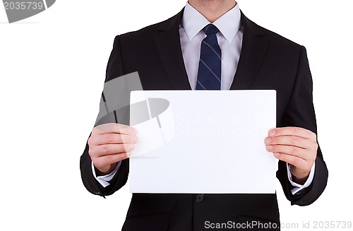 Image of business man holding blank note card