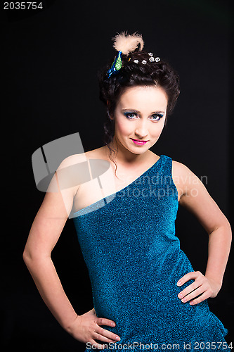 Image of beautiful girl with wearing turquoise dress