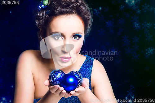 Image of beautiful girl with Christmas decoration