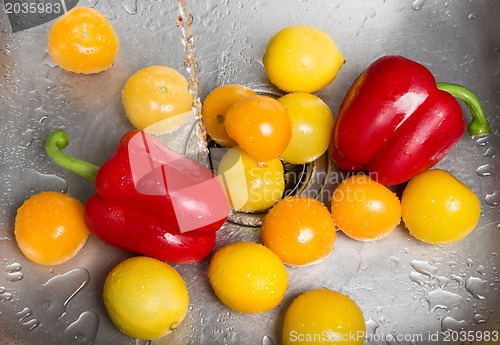 Image of Washing bright fruits and vegetables