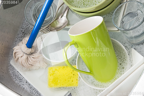 Image of Washing bright dishes