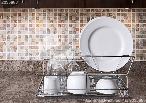 Image of Dish rack on kitchen countertop