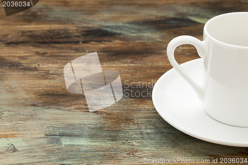 Image of coffee cup on wooden table