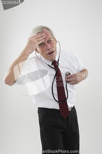 Image of Sick man checking his own heart