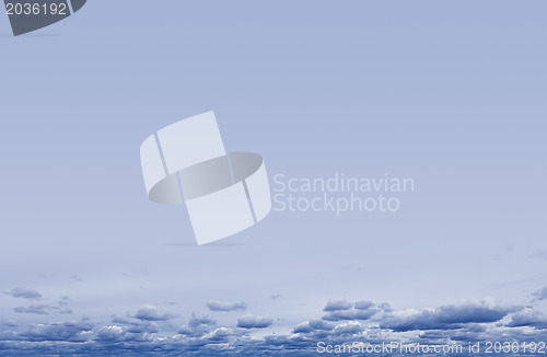 Image of Blue sky with small clouds stripe background