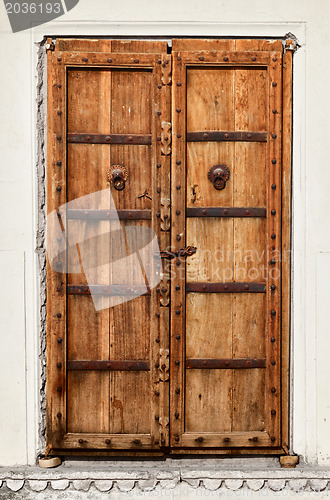 Image of An old dilapidated wooden door