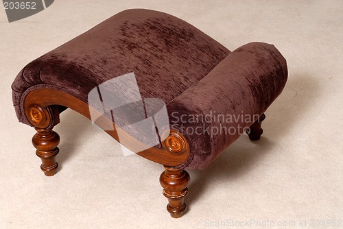 Image of Elegant brown ottoman in a living room