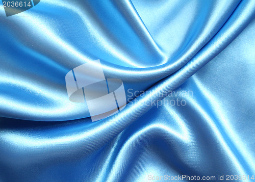 Image of Smooth elegant blue silk as background