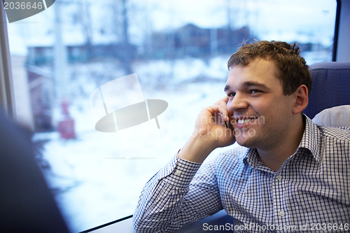 Image of Young man in the train.