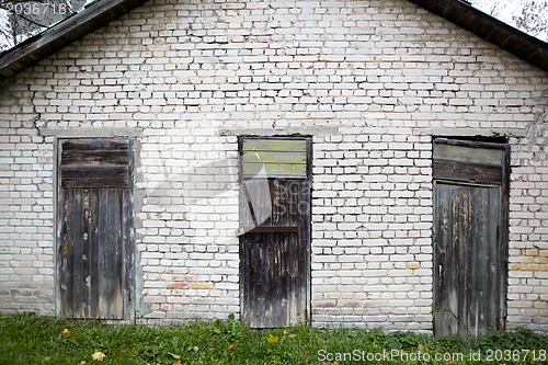 Image of Three doors in the old garage.