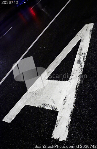 Image of Sign on asphalt