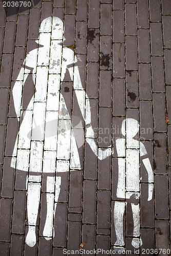 Image of Road sign mother and a child