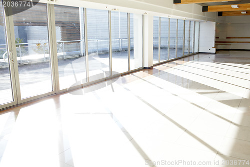 Image of Office corridor. Sunlight.