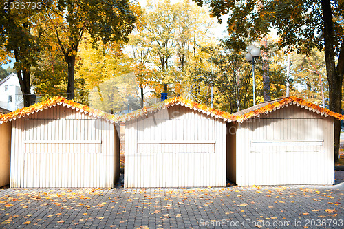 Image of Three small wooden houses