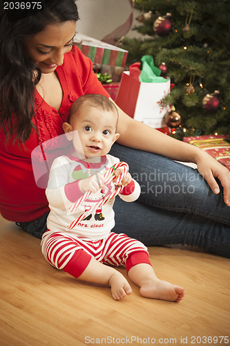 Image of Ethnic Woman With Her Newborn Baby Christmas Portrait