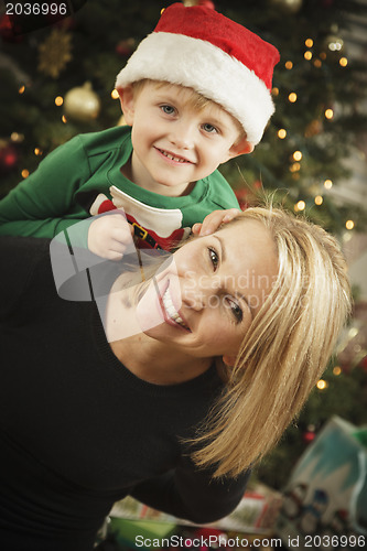 Image of Young Mother and Baby Son Christmas Portrait