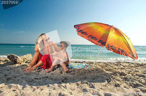 Image of family by the sea