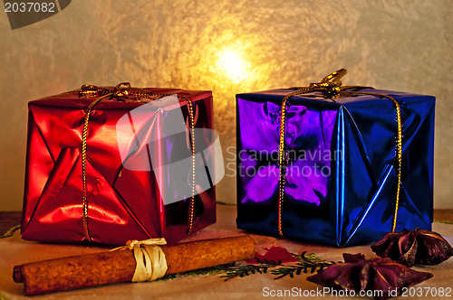 Image of christmas gifts with frozen window