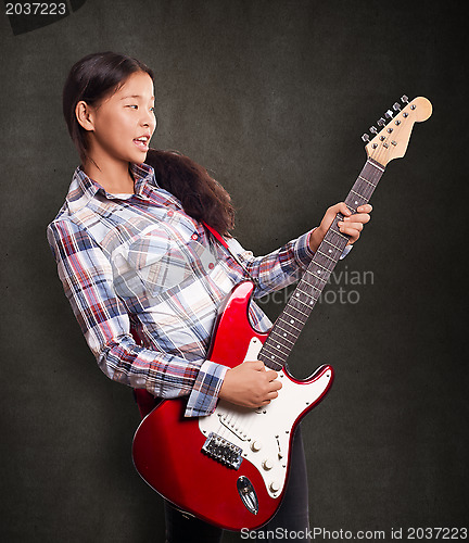 Image of Asian Girl With Guitar