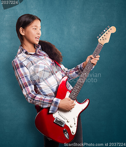 Image of Asian Girl With Guitar