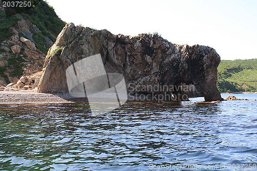 Image of Rock with the name "the Elephant drinking water". Russia. Island "Putjatin"