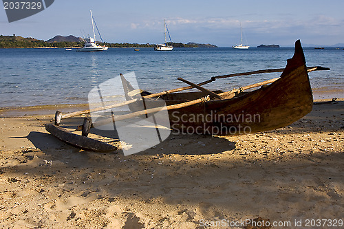 Image of madagascar nosy be rock stone branch yacht boat palm lagoon and 