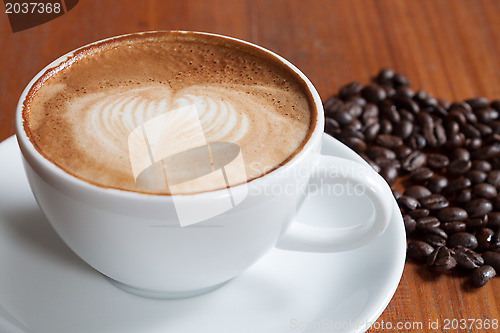 Image of Coffee cup and beans 
