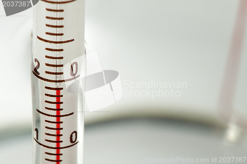 Image of Thermometer measures the temperature of the water